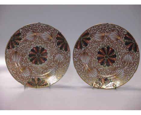 A pair of Spode gilt decorated plates  
