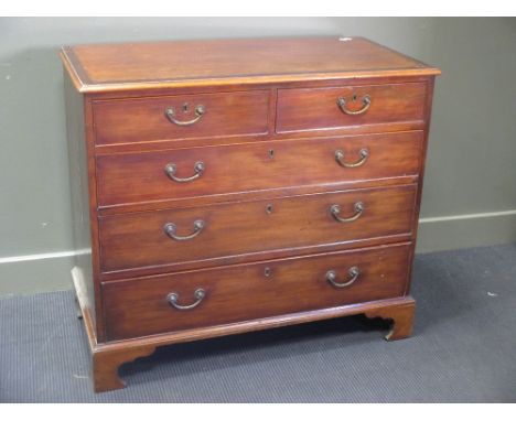 A George III mahogany straight front chest of drawers with brass handles and on bracket feet, 105cm wide  