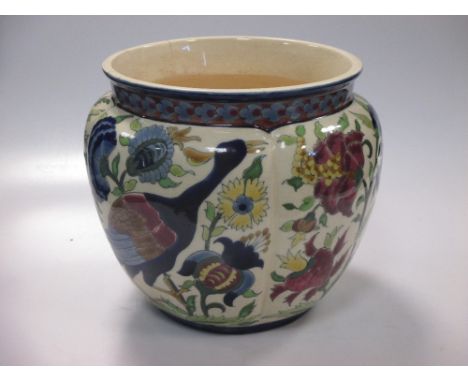 A Zsolnay bowl decorated with birds and flowers, 19.5cm high  