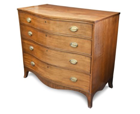 A Regency mahogany serpentine chest, of four graduated drawers with boxwood line inlaid border decoration, later brass oval p