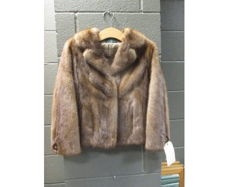 A ladies short fur coat  