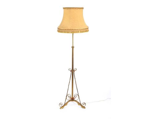 ANTIQUE BRASS STANDARD LAMP AND SHADE ON SCROLLED BASE AND THREE SQUARE PAD FEET HEIGHT: 71 INCHES GOOD CONDITION 