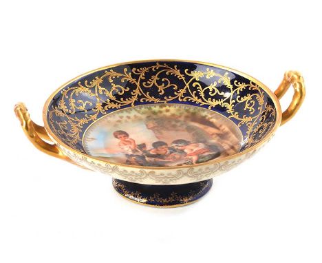 CONTINENTAL TWO HANDLED BOWL WITH ROYAL BLUE AND GILT BORDER, DECORATED WITH SCENE OF CHILDREN PLAYING TO CENTRE. HEIGHT: 3 I