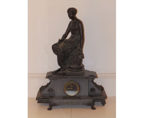 A Victorian figural bronze presentation clock on black slate base, the 24 hour dial marked for Ollivant &amp; Botsford, Manch