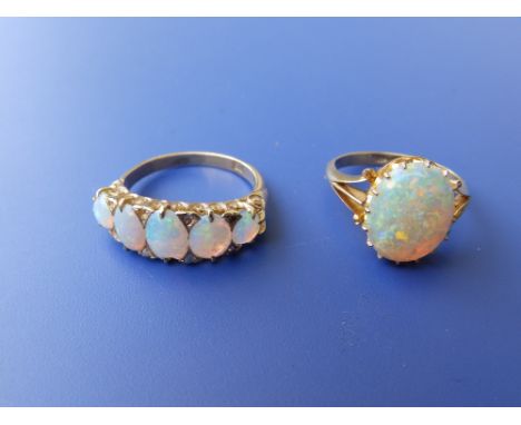 A five stone graduated opal ring set small diamonds - central opal chipped and a solitaire 18ct opal ring. (2)