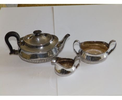 A three piece late Victorian presentation bachelor's tea service - 'Revd. Benskin, Hammersmith' 1900.  (3)