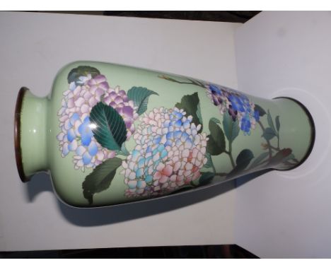 A Japanese Meiji period cloisonne vase decorated lilac blossom against a celadon green ground, 18" - crazing to enamel ground