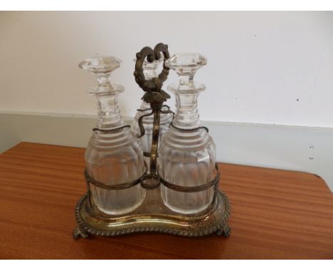 A 19thC EP three bottle decanter stand.