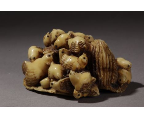 A 19th century Japanese netsuke from Meiji period. Signed Masamitsu on the base. In carved elephant ivory with horn eyes port