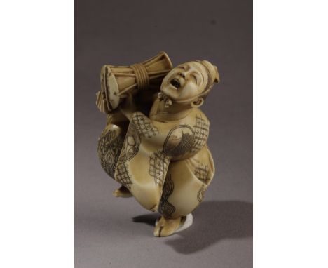 A 19th century Japanese netsuke from Meiji period. Signed Seiyuki on the back. In carved elephant ivory portraying "Saizo" th