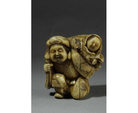 A late 19th century Japanese netsuke from Meiji period. Signed on the base. In carved elephant ivory portraying a kneeling Da