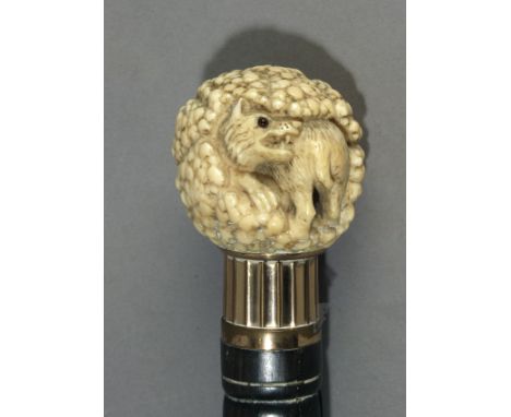 A 19th century Japanese cane from Meiji period. In ebony with embossed metalwork detail and a carved elephant ivory handle de