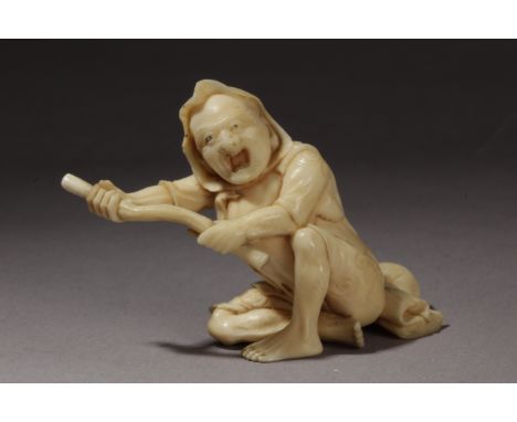 A 19th century Japanese netsuke from Edo period. Signed Yukikazu on the base. In carved ivory portraying a Menaigo sat on the