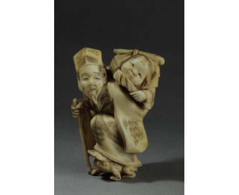 A mid 19th century Japanese netsuke from Edo period. Signed Hoichi on the back. In carved elephant ivory portraying a standin