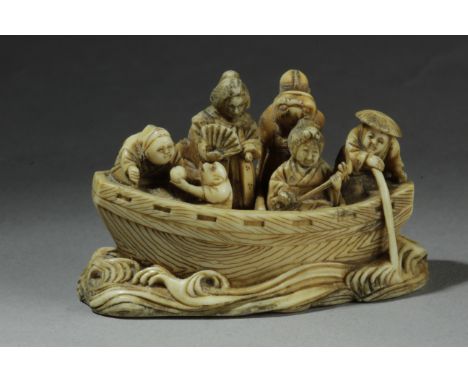 A late 19th century Japanese netsuke okimono from Meiji period. Signed Masayuki on the base. In carved ivory depicting a taka