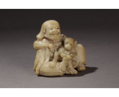 A mid 19th century Japanese netsuke from Edo period. Signed Ono Ryomin on the front. In carved ivory portraying "Sarumawashi"