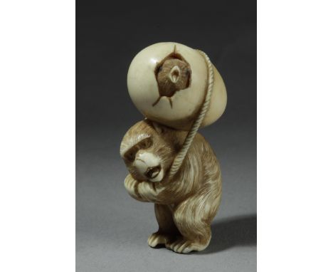 A 19th century Japanese netsuke from Meiji period circa 1860-1880. Signed Kozan on the base. In carved ivory depicting a stan