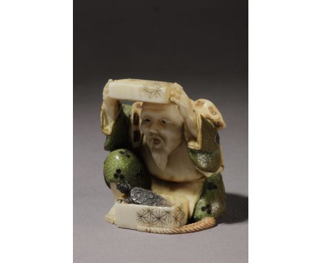 A Japanese netsuke circa 1900 from Meiji-Taisho period. Signed on the base. In carved, polychromed and inlaid elephant ivory 