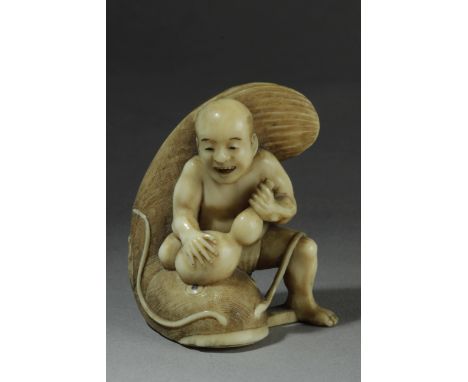 A 19th century Japanese netsuke from Meiji period. Signed on the base. In carved ivory depicting "Kadori Miojin" seated on a 