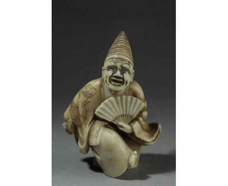 A mid 19th century Japanese netsuke from Edo period. Signed Hojitokusai Hogen on the back side. In carved ivory portraying "S