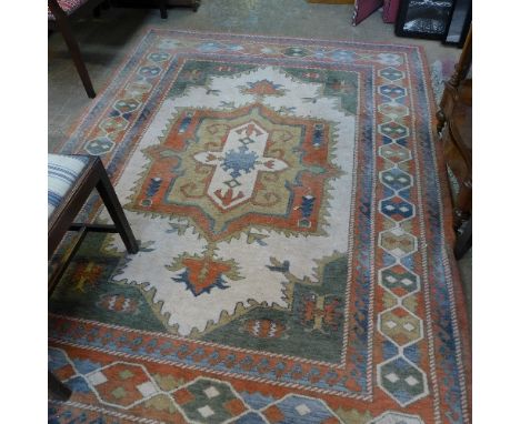 A Chinese style carpet with beige ground