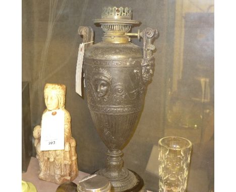 A classical champagne urn spelter lamp base on turned support