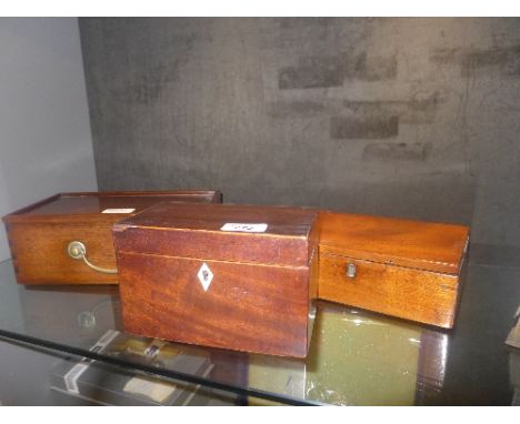 A C19th mahogany tea caddy and two other similar boxes