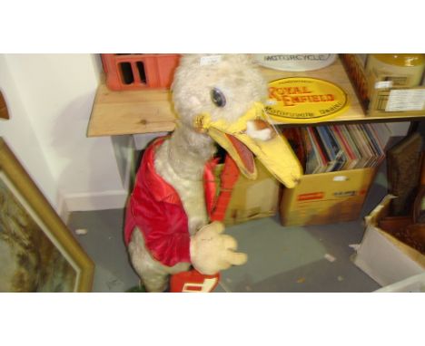 Vintage floor standing Duck playing electric guitar