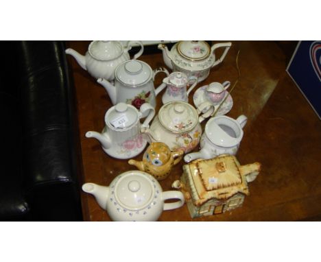 Assorted decorative tea pots & brass ware & firescreen etc.