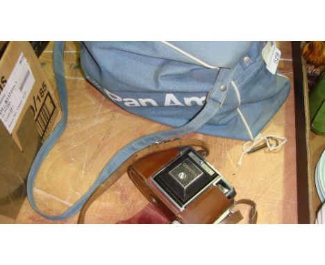 Pan Am flight bag and vintage Zeiss Ikon Contessa camera with accessories