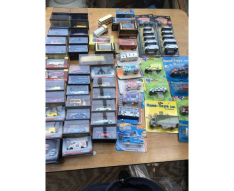 A collection of boxed diecast vehicles including 1:76 scale, Corgi, Oxford, Hot wheels, Base toys etc