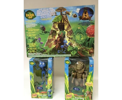 A bugs life boxed Ant hill, a talking Flick and a talking hopper. (3)
