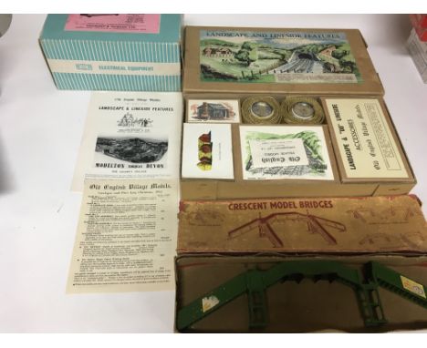 A box containing railway accessories including OO scale, Landscape and Lineside features model kit , Crescent model Diecast b