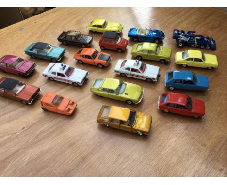 A collection of loose diecast vehicles including Corgi whizzwheels and Solido