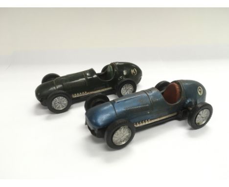 Two vintage Scalextric racing cars.