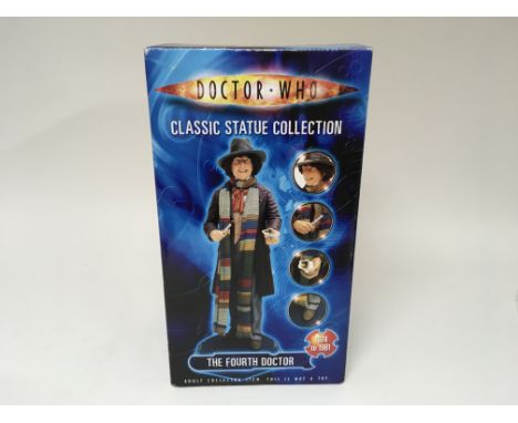 Doctor Who Classic Statue signed by Tom Baker, including a photo of him signing the item.