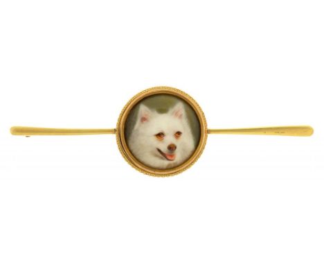 A GOLD BAR BROOCH set with an enamel of  the head of a dog by William Bishop Ford (1832-1922), 1.8cm diam,  signed and dated 