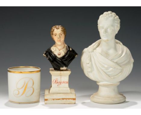 A STAFFORDSHIRE MINIATURE PORCELAIN BUST OF LORD BYRON ON A PEDESTAL, A BISCUIT PORCELAIN BUST OF BYRON AND A FRENCH PORCELAI
