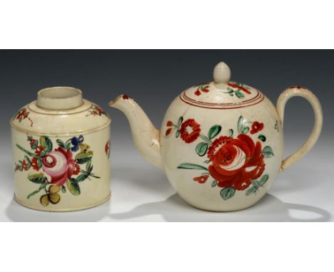 A CREAMWARE BULLET TEAPOT AND COVER AND A TEA CANISTER, C1770 AND 80  painted with scattered flowers in red, black and green 