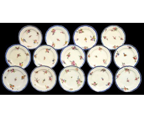 FOURTEEN SÈVRES FEUILLE DE CHOUX PLATES, 1760S-1780S  painted with scattered bouquets, the painters including Pierre le jeune