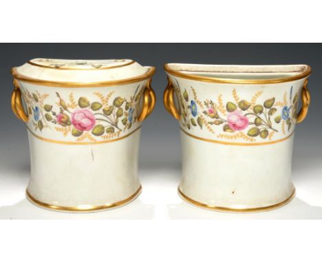 A PAIR OF DAVENPORT BULB POTS AND COVER, C1807-12  of hybrid hard paste porcelain, painted with trailing roses and bellflower