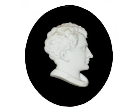 A BISCUIT PORCELAIN BAS RELIEF PORTRAIT OF  LORD BYRON, EARLY 19TH C on oval black glass mount, 10.9 x 5cm, framed++Good cond