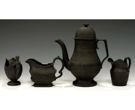 A SPODE BLACK BASALT CREAM JUG WITH WINGED FIGURE HANDLE, C1790-1820 11cm h, impressed mark, two contemporary black basalt cr