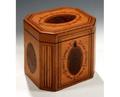 A GEORGE III SATINWOOD, YEW WOOD AND INLAID TEA CADDY, C1790 with ovals and hollow fluting to the corners, the lock original,