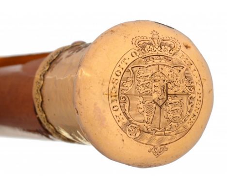 ROYAL.  A GEORGE III GOLD MOUNTED MALACCA WALKING CANE  the  pommel engraved with the 1816-37 royal arms, the lower part chas