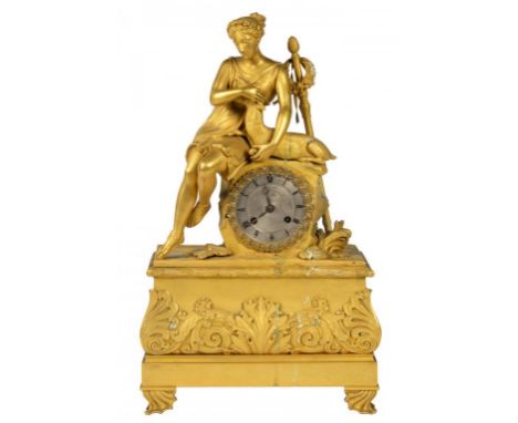 A LOUIS PHILIPPE  ORMOLU MANTEL CLOCK, C1840 with the seated figure of a maiden embracing a kid, her thyrsus propped behind a