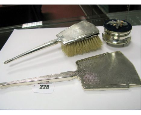 A Matching Hallmarked Silver Backed Hair Brush and Hand Mirror, each engine turned; together with a trinket pot. (3)