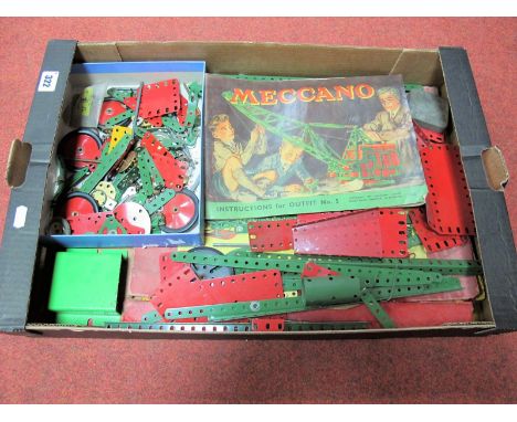 A Quantity of Green and Red Meccano Pieces, automobile accessories, and a Mecanno No. 5 instruction booklet and No.'s box par