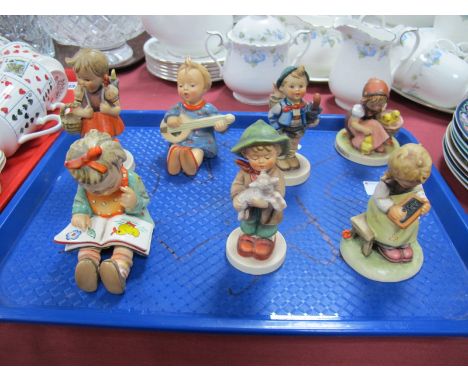Seven Hummel Figures, including Chick Girl, Seated Girl with Guitar, Boy with Umbrella, Seated Girl Reading,etc:- One Tray