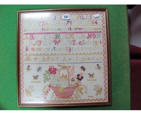 XIX Century Woolwork Tapestry by Mary Gillott, aged twelve years 1878, framed with the alphabet, decorated with a basket of f